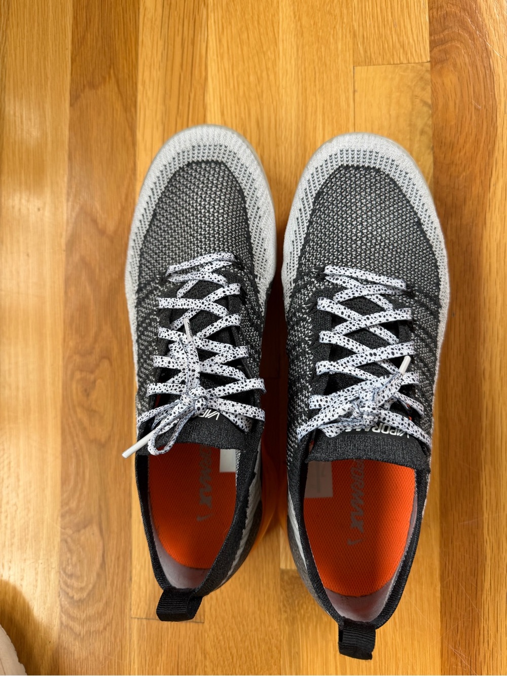 Men’s Nike Flyknit Sneakers in Black and Gray with Speckled White Laces